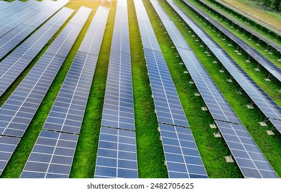 Solar farm and sun light. Solar power for green energy. Sustainable renewable energy. Photovoltaic power station or solar park. Solar panel installation and maintenance concept. Energy sustainability. - Powered by Shutterstock