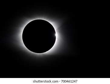 Solar flare and diamond ring around 2017 total eclipse - Powered by Shutterstock