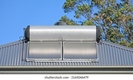 Solar Hot Water System On The Roof Of A House