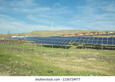Solar panel, alternative electricity source - concept of sustainable resources . Solar-powered . Modern biogas factory, using sugar beet pulp as a renewable form of energy production. biogas plant