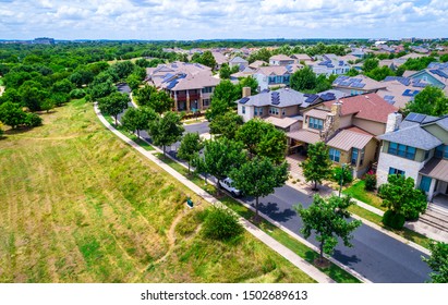 Solar Panel Community Mueller District Of East Austin , Texas , USA 2019 Aerial Drone View Of Solar Panel Rooftops On Suburb Housing Neighborhood 