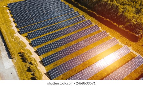 solar panel farm in green field aerial view drone footage - Powered by Shutterstock