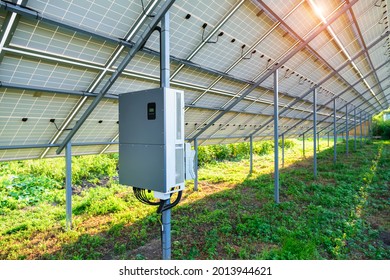 Solar panel inverter under canopy in the backyard made for solar power plant, an ecological alternative source of electricity. Back view