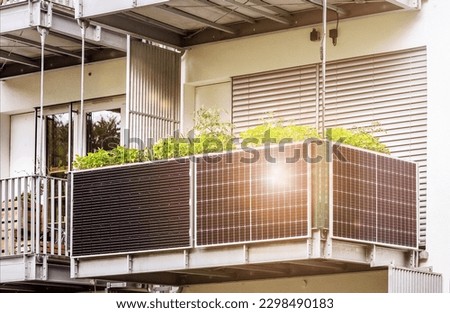 Solar Panel in Modern Balcony of Apartment Building with Sun light Reflection. Solar Energy of  Apartments Flat. Eco Apartment in Eco City.