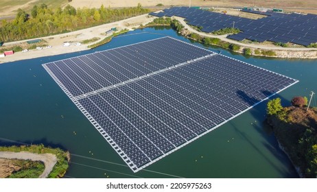 Solar panel mounting structure installation. This system is floated on your dam, river, reservoir, or lake to reduce evaporation and keep your solar PV panels cool for optimal performance - Shutterstock ID 2205975263