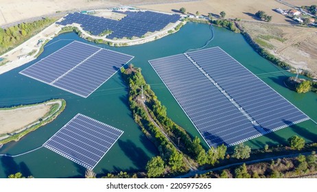 Solar panel mounting structure installation. This system is floated on your dam, river, reservoir, or lake to reduce evaporation and keep your solar PV panels cool for optimal performance - Shutterstock ID 2205975265