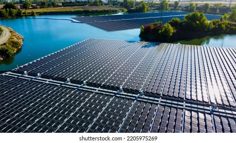 Solar panel mounting structure installation. This system is floated on your dam, river, reservoir, or lake to reduce evaporation and keep your solar PV panels cool for optimal performance - Shutterstock ID 2205975269