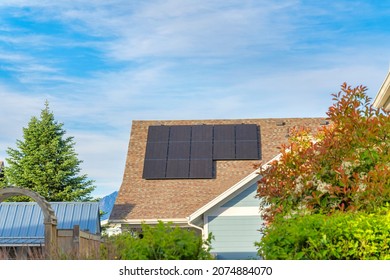 Solar panel on a roof of a house with asphalt composite shingles at Daybreak, Utah