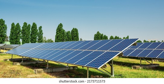 Solar panel of a solar park. Photovoltaic modules of a Solar energy power plant producing sustainable energy to prevent climate change. - Shutterstock ID 2173711573