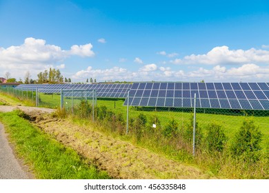 Solar panel produces green, environmentally friendly energy from the sun. - Shutterstock ID 456335848