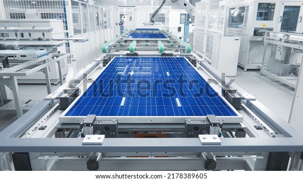 Solar Panel Production Process at Modern Bright\
Automated Factory. Shot of a Solar Panel on Assembly Line During\
Manufacturing Process. 