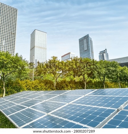 Solar panel system integrated with modern city buildings promoting renewable energy and sustainable development.