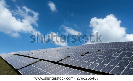 Solar Panels Array Under Blue Sky