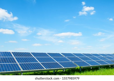 Solar panels and blue sky. Solar panels system power generators from sun. Clean technology for better future - Shutterstock ID 1557985979