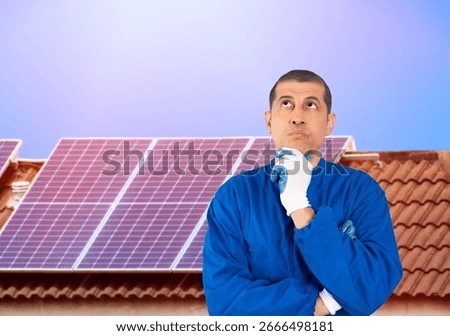 Solar panels, engineer installing them in doubt and looking at a corner with his hand on his chin