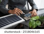 Solar panels green energy Business man working  green eco friendly office business creative idea Planing Bio economy for business eco friendly professional Engineer sustainable electricity.
