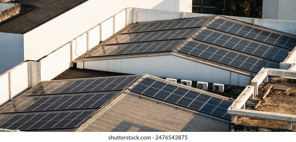 Solar panels installing on commercial building roof use for ecological and renewable energy - Powered by Shutterstock