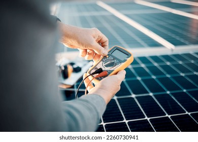 Solar panels, multimeter and engineering hands for voltage check, installation or maintenance. Sustainability, eco friendly or energy saving technology, contractor inspection or troubleshooting tools - Powered by Shutterstock