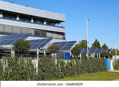 Solar Panels Next To An Office Building