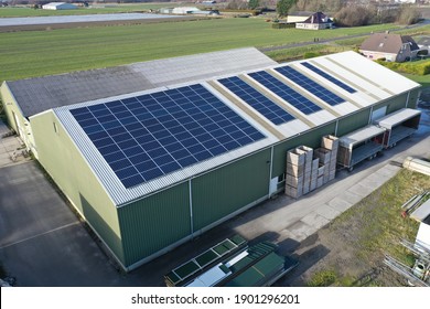 Solar Panels On A Commercial Building This Is New Technology And Cheap And Sustainable Energy. Photo Taken With A Drone
