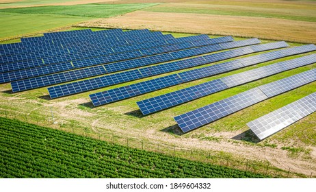 Solar Panels On Field In Summer, Aerial View Of Poland, Europe