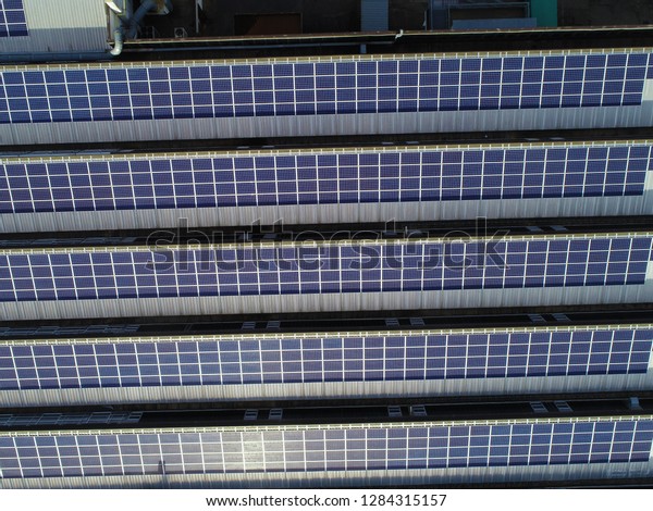 Solar panels on the roof\
of a company