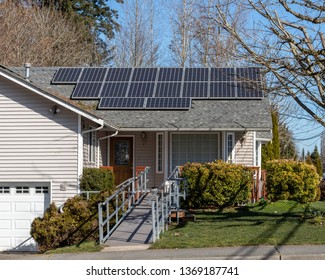 Solar Panels On The Roof Of A Home With Wheel Chair Ramp