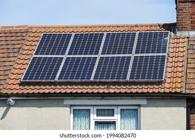 Solar Panels On The Roof Of A House In London, England, United Kingdom, UK