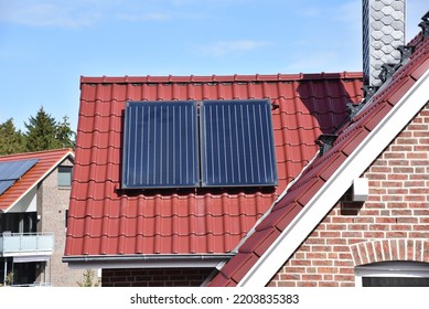 Solar Panels On The Roof Of A House