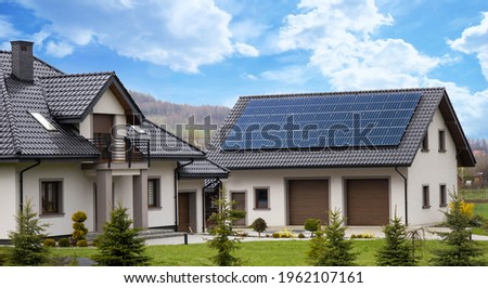 solar panels on roof of the house renevable energy  green power photovoltaic