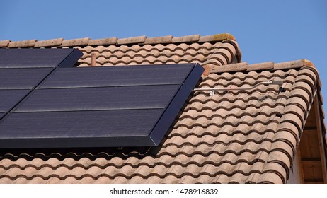 Solar Panels On The Roof Of A Single Family Home In California                                