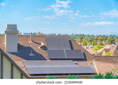 Solar Panels On Top Of The Asphalt Composite Shingles Roof Of A House At Ladera Ranch, California