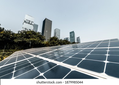 Solar Panels And Urban Background At Shenzhen City