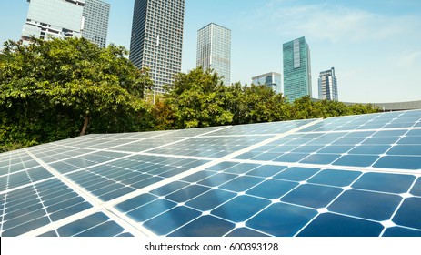 Solar panels and urban construction background - Shutterstock ID 600393128