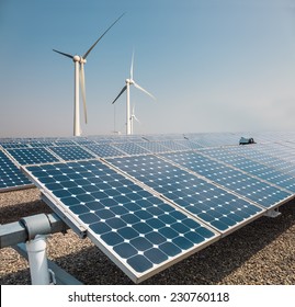 Solar Panels And Wind Power Farm , New Energy Background 