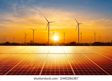 solar panels with wind turbine farm at sunset. concept of clean energy. Energy supply, distribution of energy, Powerplant, energy transmission, high voltage supply concept - Powered by Shutterstock