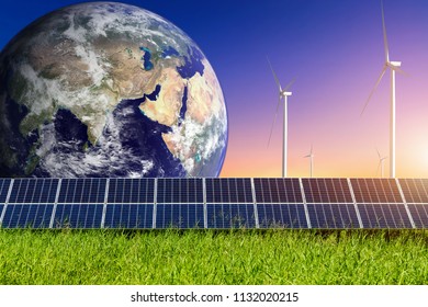 solar panels with wind turbines against  landscape and earth,Alternative energy concept,Clean energy,Green energy,Elements of this earth image furnished by NASA.