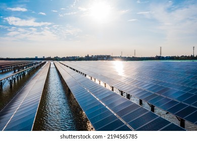 Solar Photovoltaic Power Station On Water. Green Energy Concept.