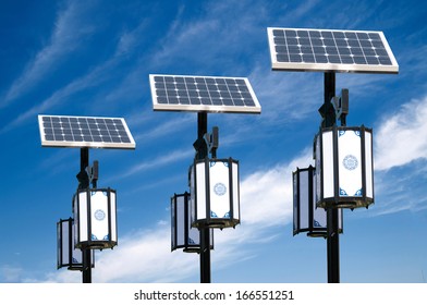 Solar photovoltaic powered lamp posts on the blue skies with sun