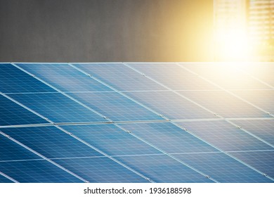Solar photovotaic panel at a roof at suset.  Solar energy house company concept image. - Shutterstock ID 1936188598