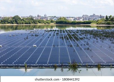  solar power panels floating in a pond