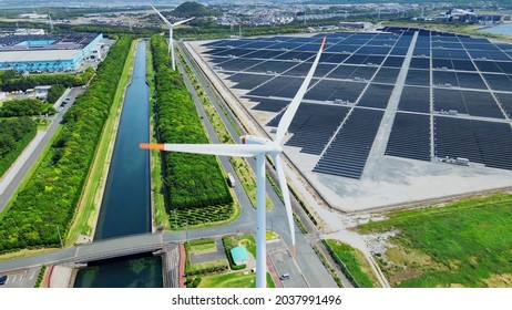 Solar power plant and Windmills aerial view. Renewable energy. Green tech. - Shutterstock ID 2037991496
