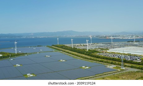 Solar Power Plant And Windmills Aerial View. Renewable Energy. Green Tech.