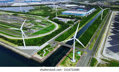 Solar Power Plant And Windmills Aerial View. Renewable Energy. Green Tech.