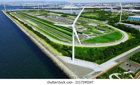 Solar Power Plant And Windmills Aerial View. Renewable Energy. Green Tech.