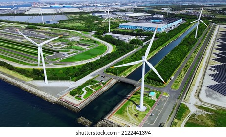 Solar Power Plant And Windmills Aerial View. Renewable Energy. Green Tech.