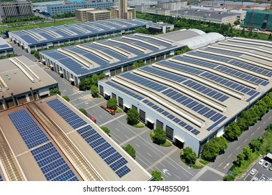 solar power station with factory - Shutterstock ID 1794855091