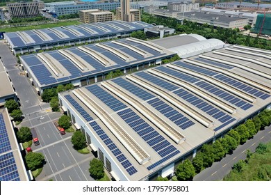 solar power station with factory - Shutterstock ID 1795795801