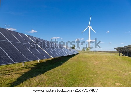 Solar power stations. Blue solar panels over blue sky close up. Alternative renewable clean green power. Nature generation electric technology. Eco electricity background, Renewable energy. Stockfoto © 