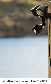 Solar powered sensor lights mounted to a pole